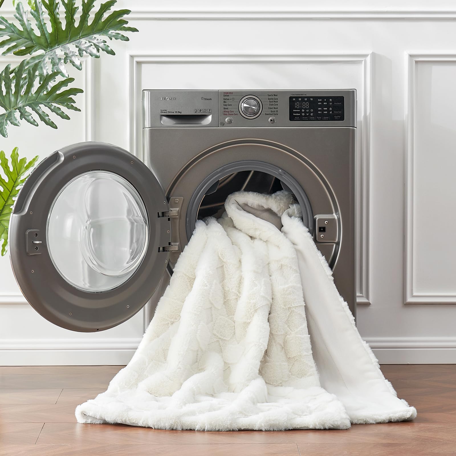 Cozy Bliss throw on bed in lifestyle scene showing neutral color and benefit: blends with decor