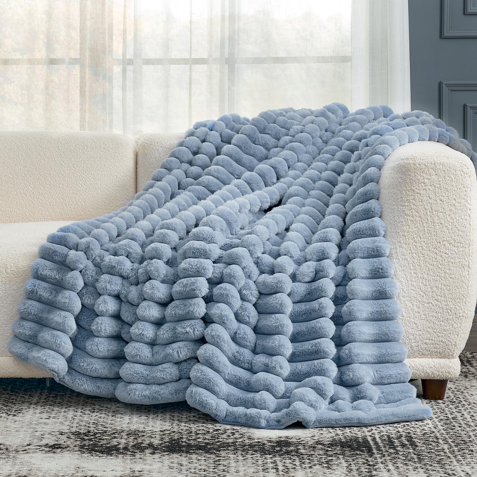 Cozy Bliss at foot of bed adding soft color and layered warmth
