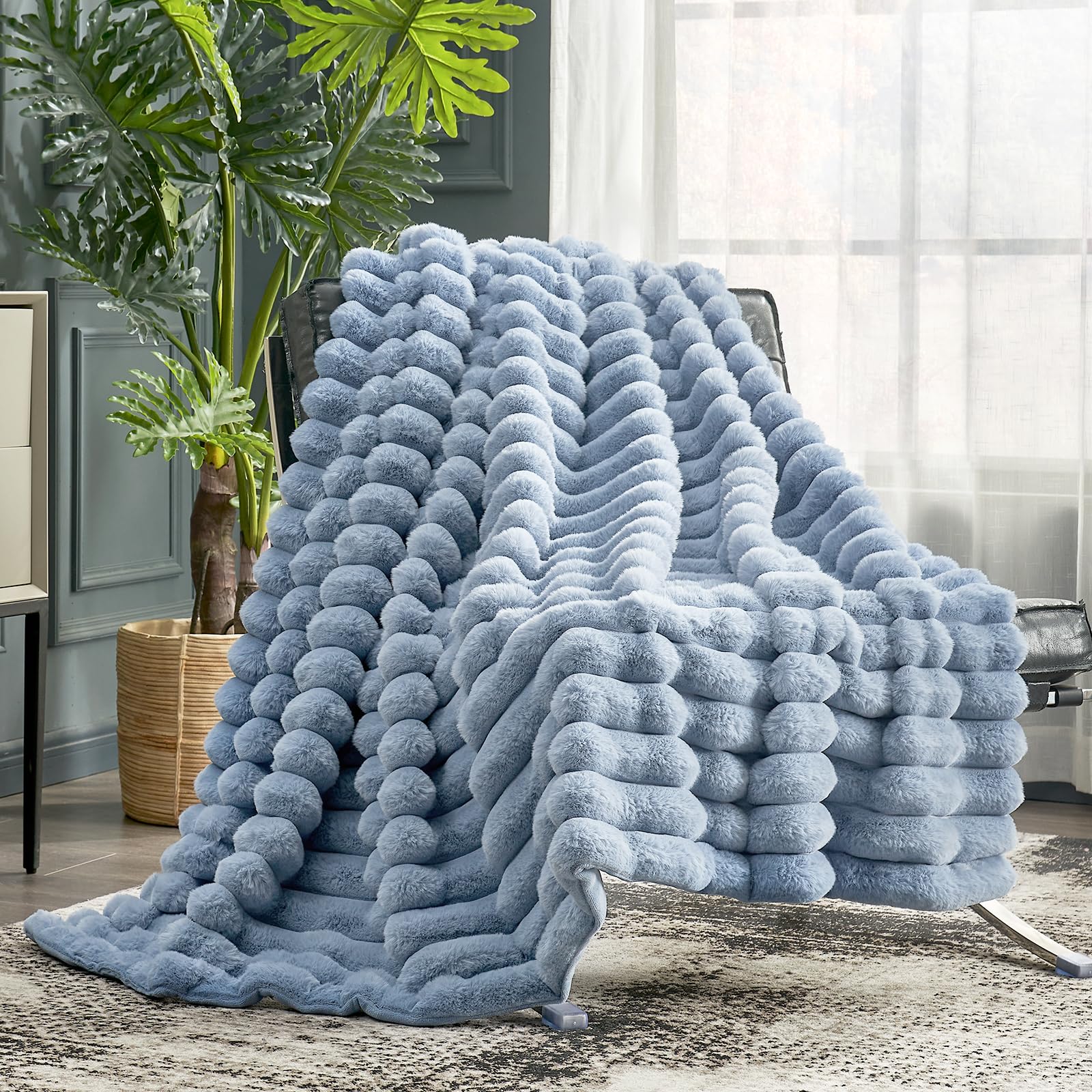 Cozy Bliss front view on couch showing light blue throw for cozy decor