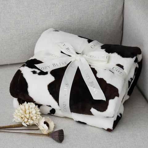 Cozy Bliss next to a chair for scale displaying true 90x90 generous coverage