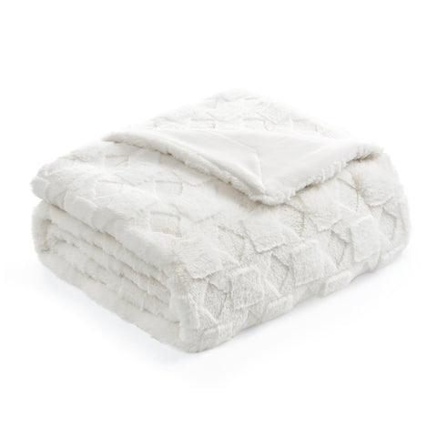 Cozy Bliss stitched edge and label close-up showing quality finish and benefit: durable construction