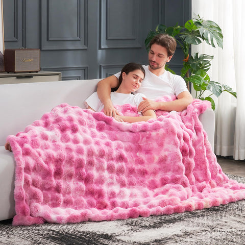 Cozy Bliss folded on bed offering decorative and warm bedroom styling
