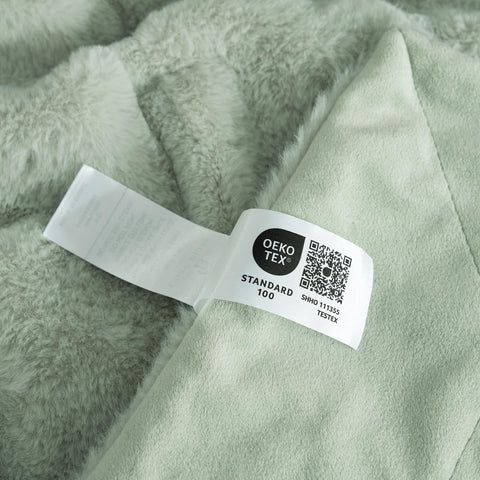 Cozy Bliss folded on bench with scale reference showing size and thickness benefit