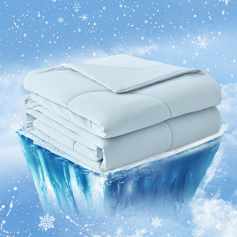 Cozy Bliss front view of blue twin cooling comforter showing tidy corners and smooth finish, promotes cool sleep