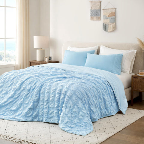 Cozy Bliss front view of queen comforter showing plaid and cooling side benefits