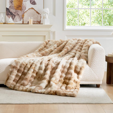 Cozy Bliss held at corner to show softness and lightweight handling benefit