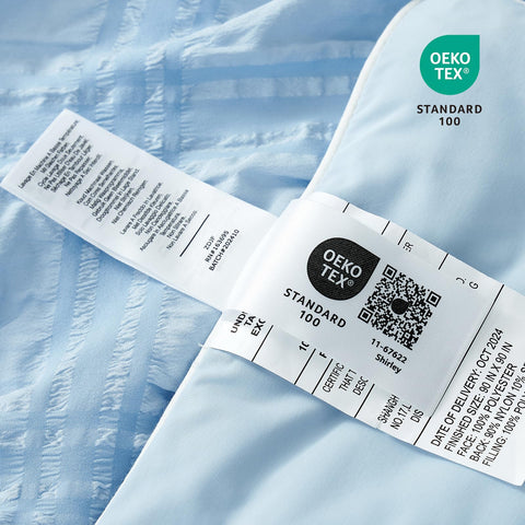 Cozy Bliss care tag close-up showing washing instructions that preserve cooling