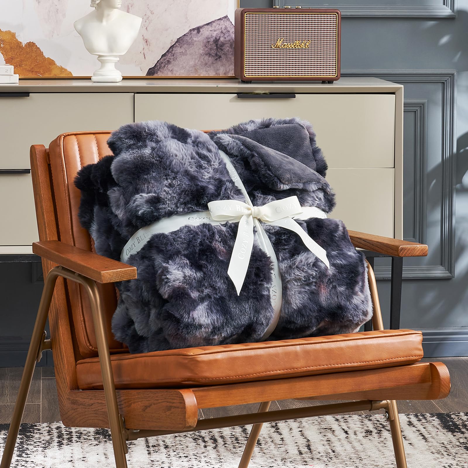Cozy Bliss throw draped on sofa showing cozy lounging benefit