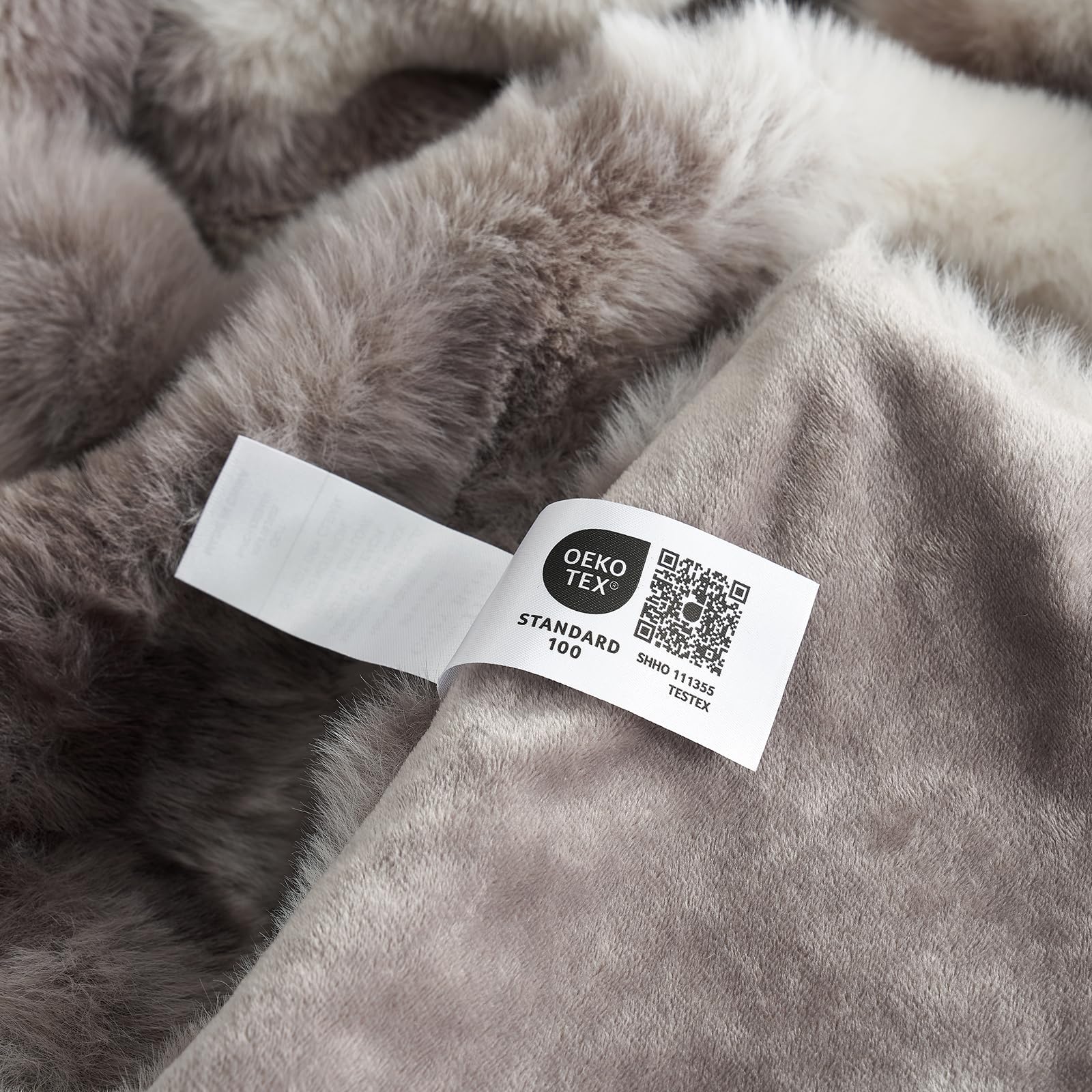 Cozy Bliss person wrapped in throw showing soft warmth and relaxation