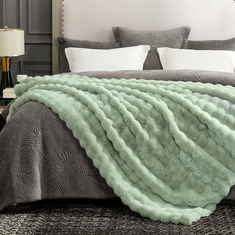 Cozy Bliss micromink reverse view illustrating smooth backing and insulating comfort benefit