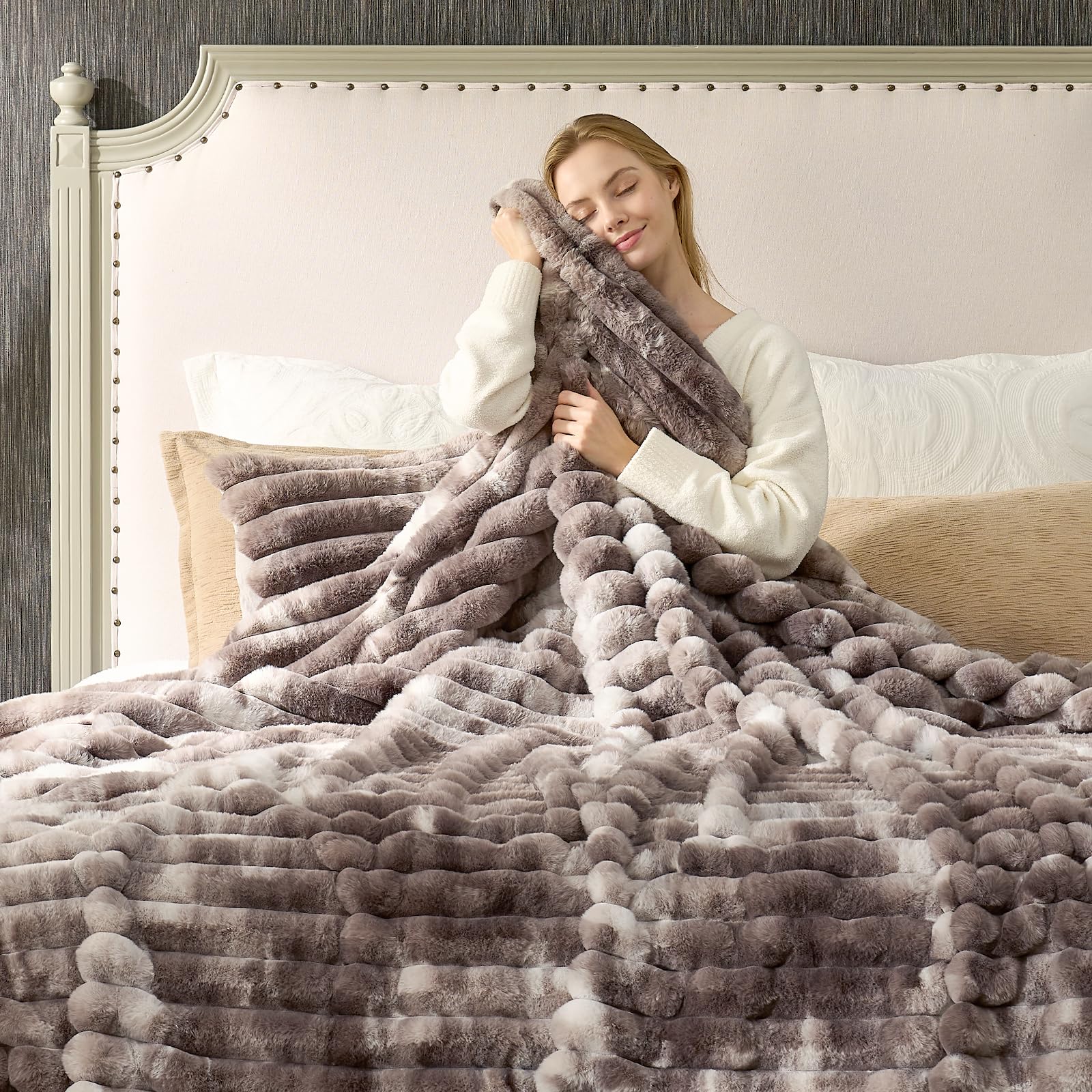Cozy Bliss compared on chair to show 50 x 60 inch scale