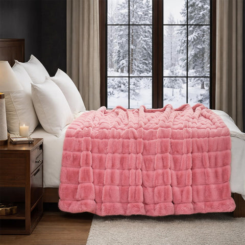 Cozy Bliss next to a pillow showing 50x60 scale and practical fit