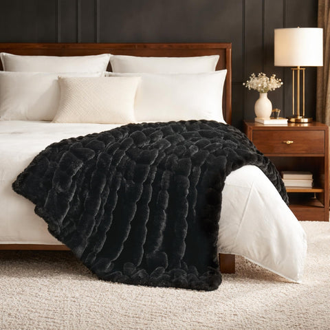 Cozy Bliss throw draped on sofa showing 50x60 scale and fit
