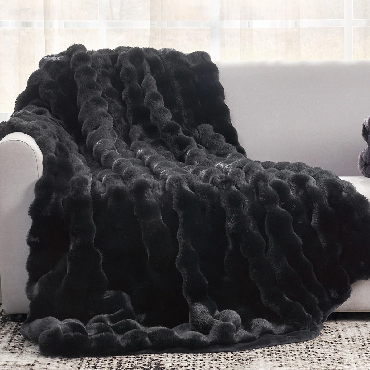 Cozy Bliss throw front folded showcasing plush bubble texture and warm comfort