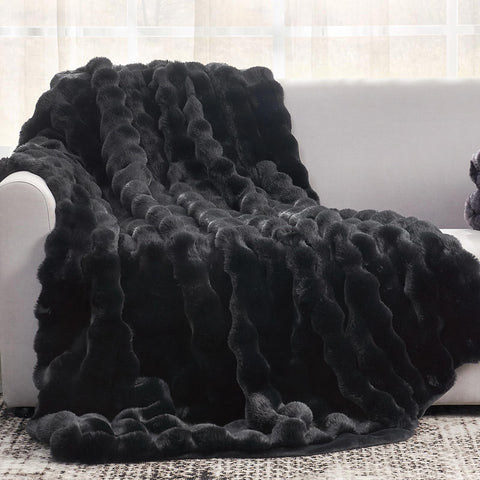 Cozy Bliss throw front folded showcasing plush bubble texture and warm comfort