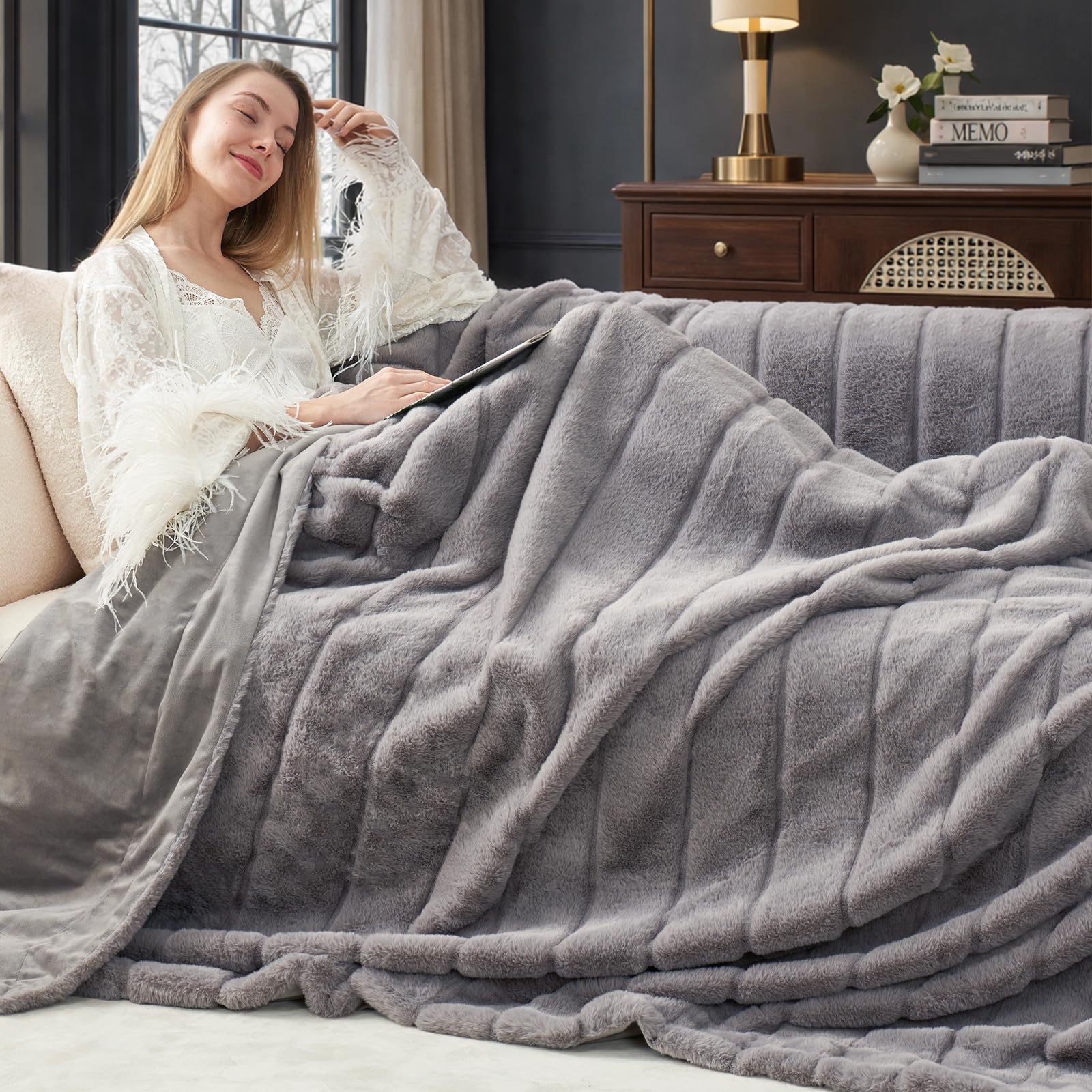 Cozy Bliss throw front view showing plush grey faux fur and elegant finish for cozy decor