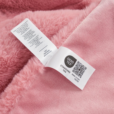 Cozy Bliss throw on bed adding a warm decorative layer and comfort