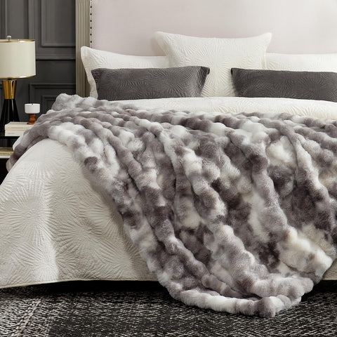 Cozy Bliss blanket draped to show 60x80 scale and full coverage benefit