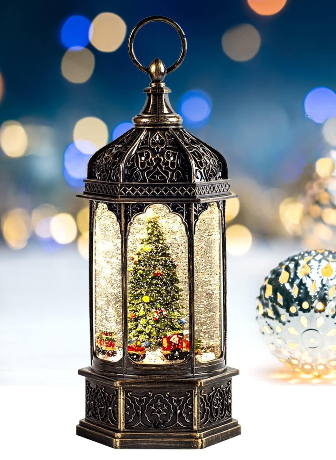 COZY-PAVILION front lantern view showing lit musical tree and rotating trains for festive ambiance