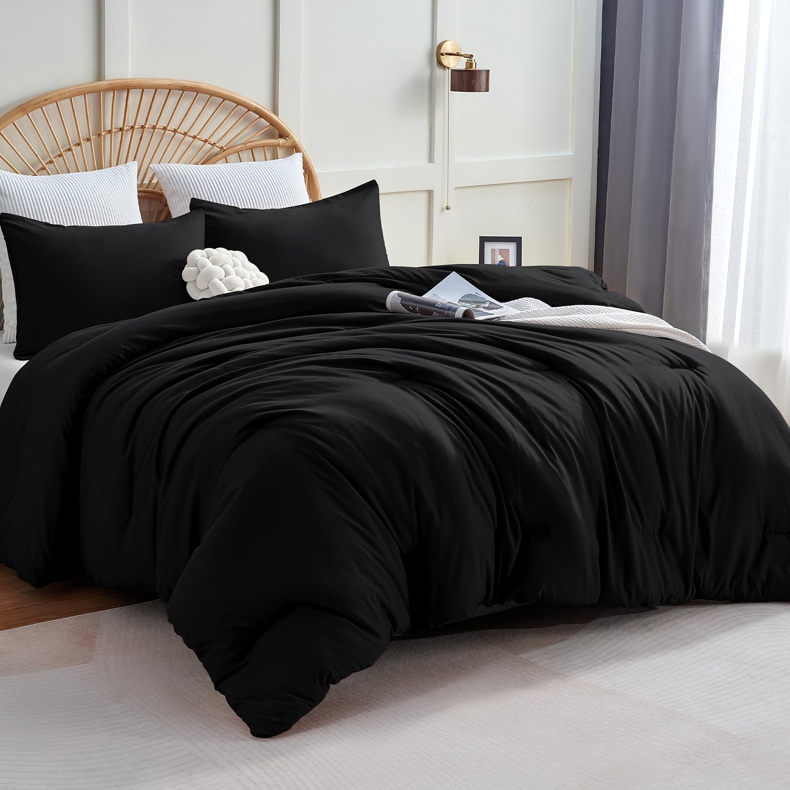 CozyLux black comforter front view showing generous drape and neat quilted pattern