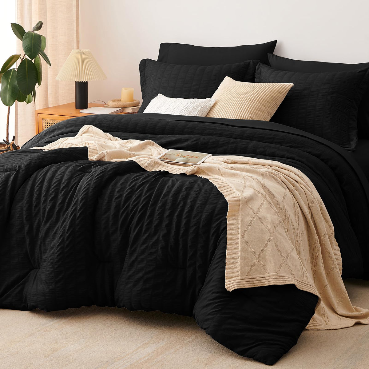 CozyLux comforter front flat lay showing sleek black color and coordinated design benefit: effortless styling