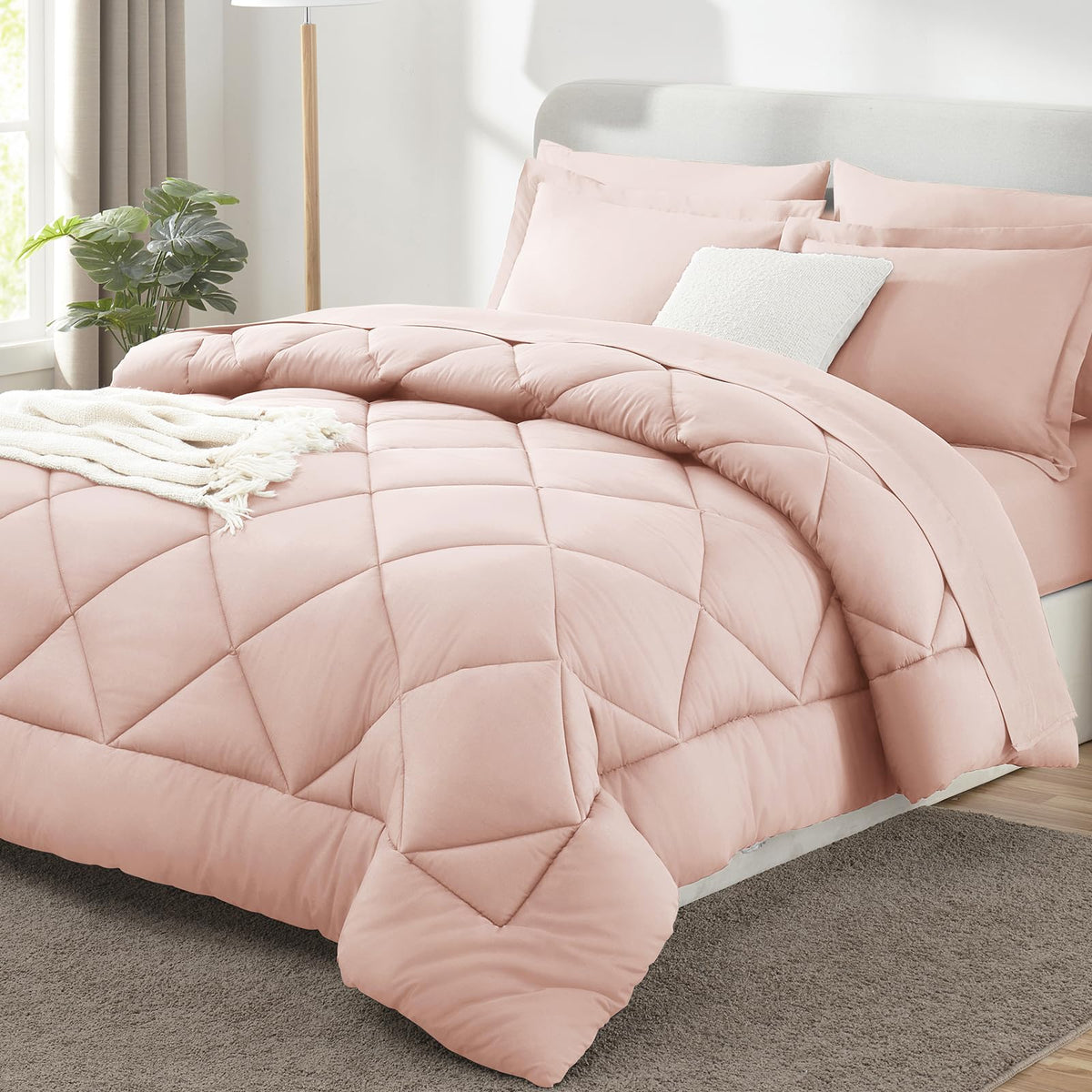 CozyLux comforter front view showing blush pink color and neat drape for styling