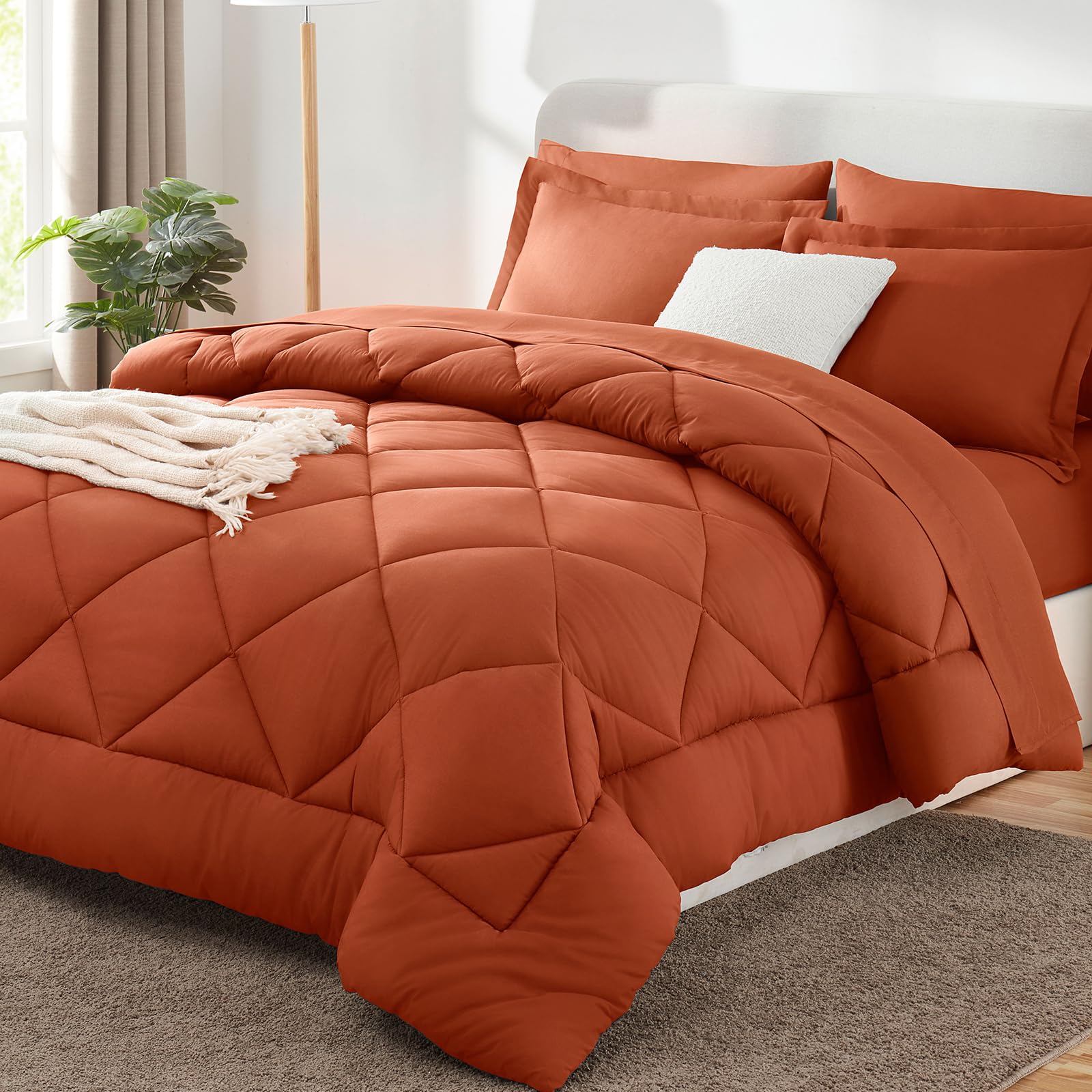 CozyLux comforter front view on bed showing color and neat finish benefit