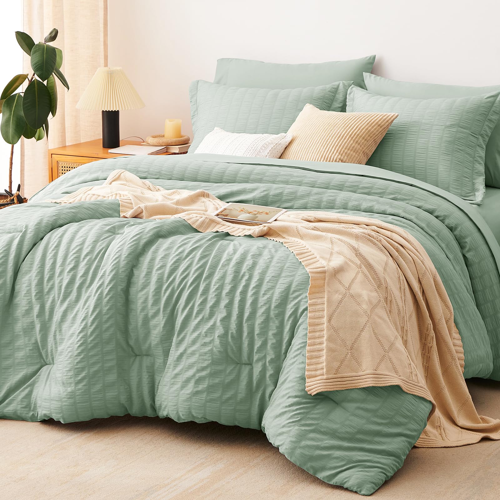 CozyLux comforter set front view showing sage green seersucker and coordinated pieces