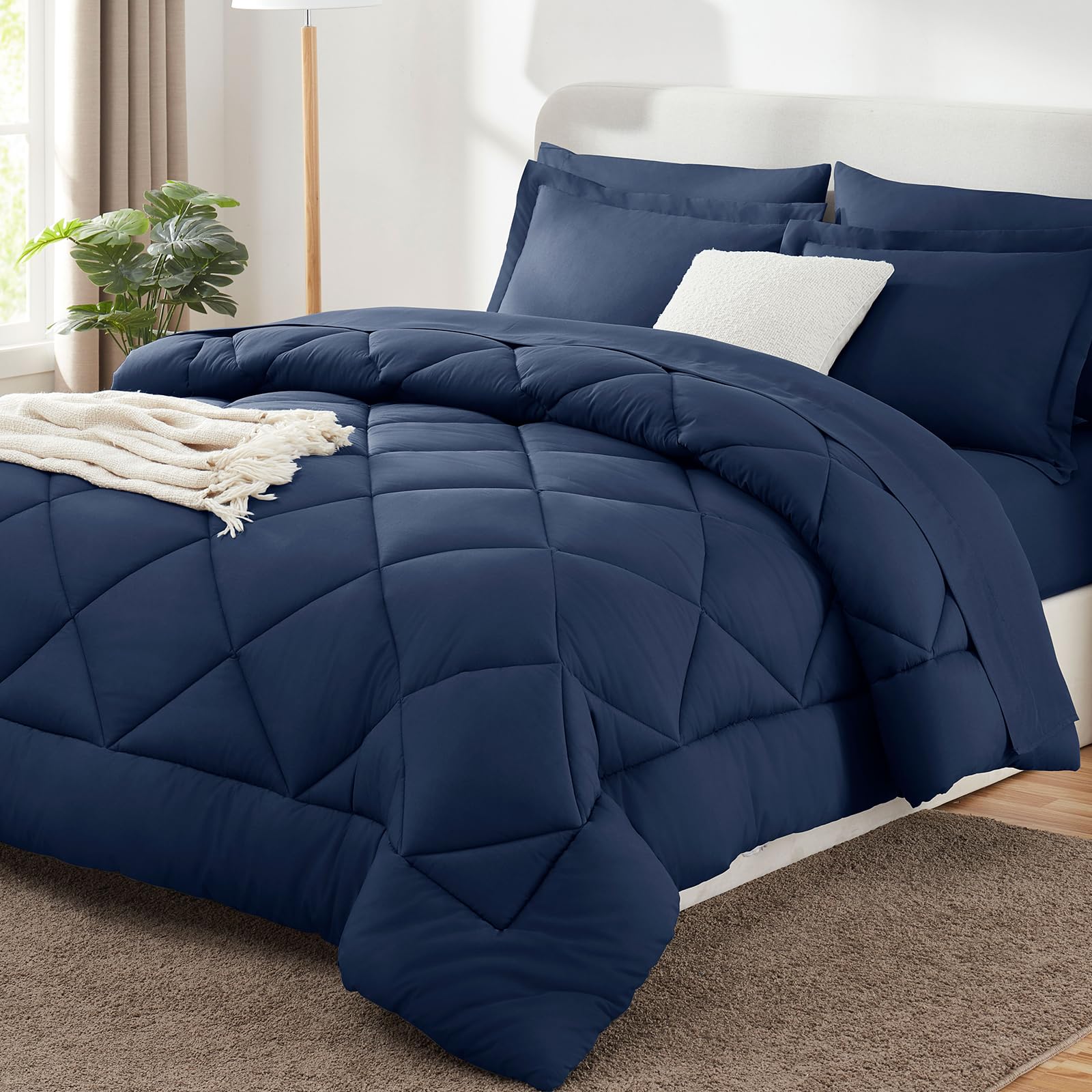 CozyLux front view of navy king set showing coordinated pieces and neat styling
