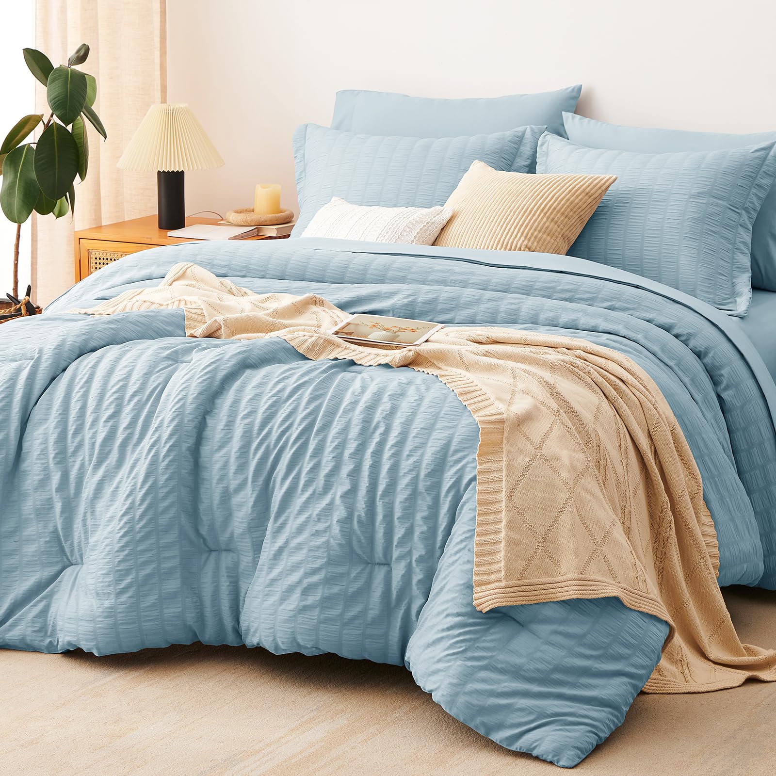 CozyLux front view showing light blue seersucker comforter and coordinated set benefits