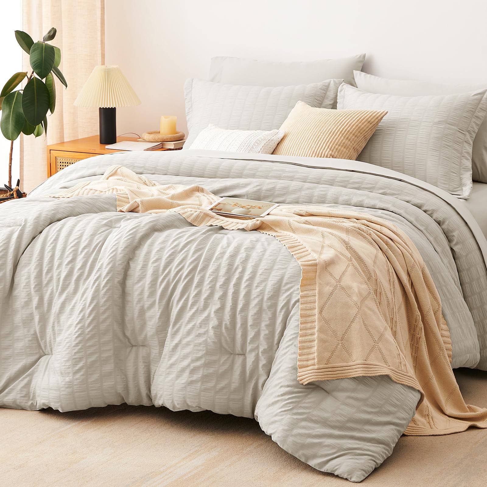 CozyLux king comforter front view showing beige seersucker and neat drape Benefit: stylish easy-care bedding