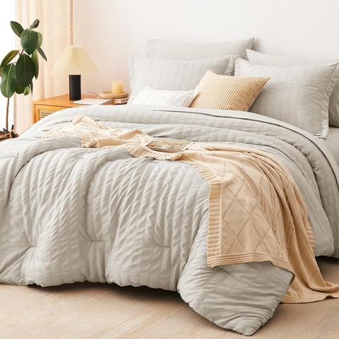 CozyLux king comforter front view showing beige seersucker and neat drape Benefit: stylish easy-care bedding