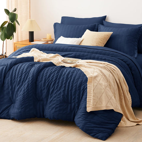 CozyLux queen comforter front view showing navy seersucker and cozy aesthetic