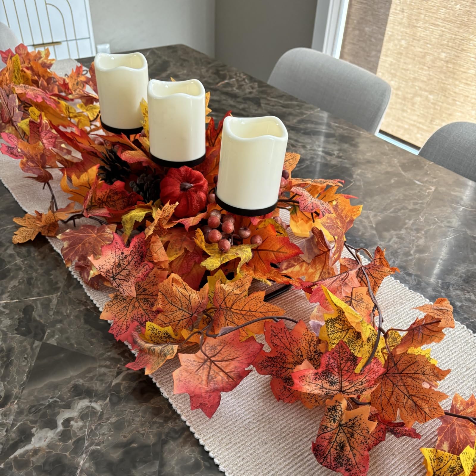 CQURE garlands woven along staircase banister adding seasonal curb appeal