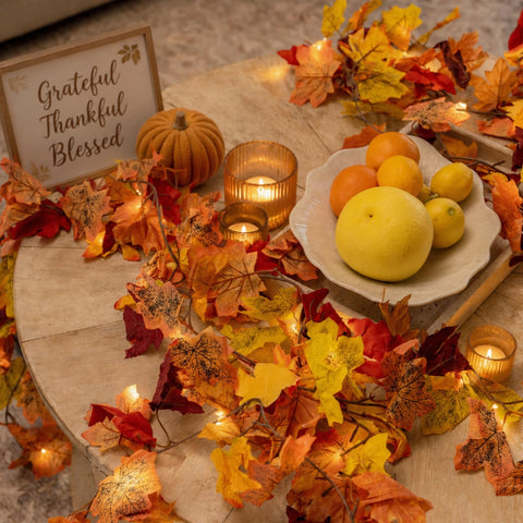 CQURE wrapped around a banister for easy stairway seasonal decor