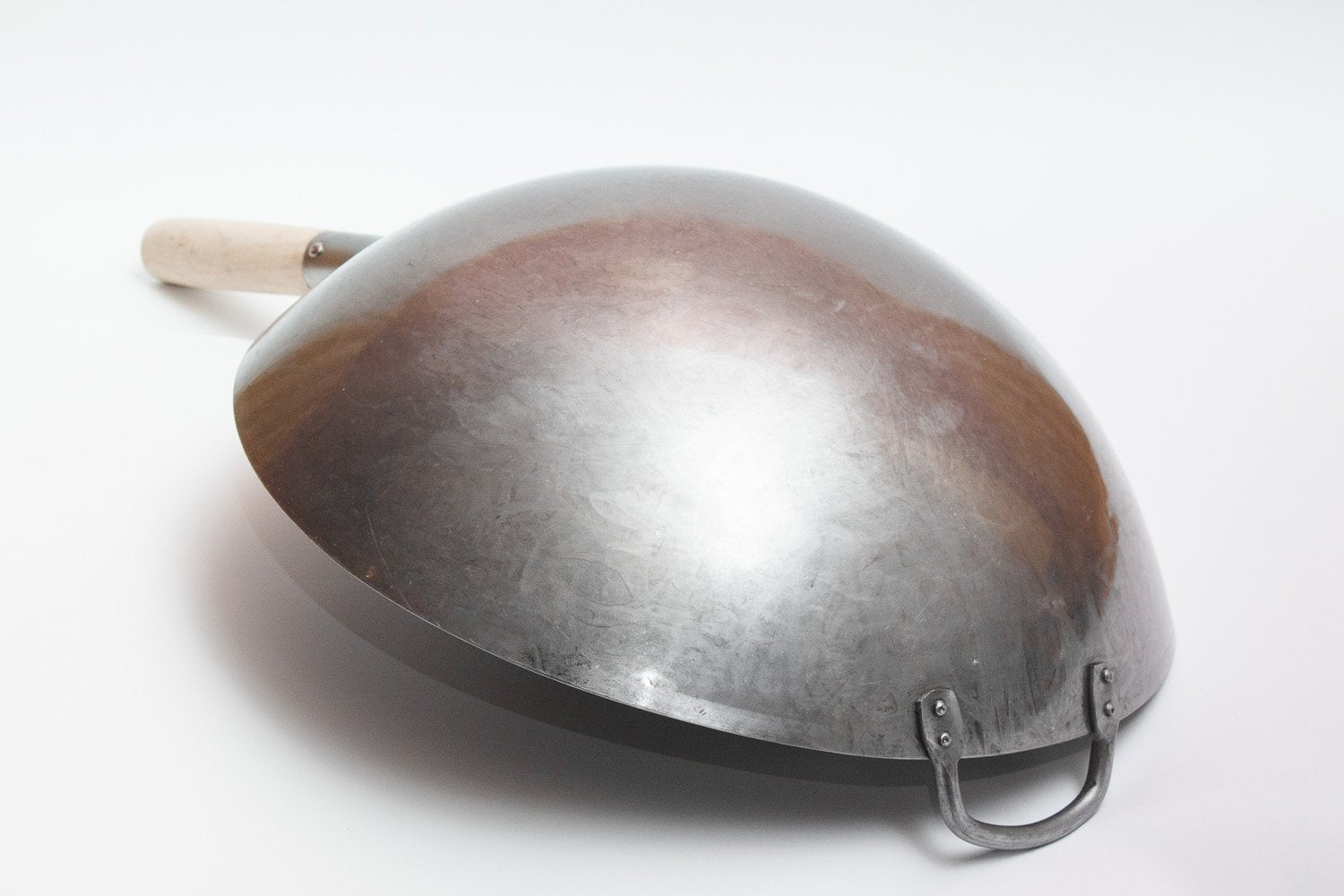 Craft Wok hand-hammered surface close-up improving seasoning retention