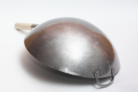 Craft Wok hand-hammered surface close-up improving seasoning retention