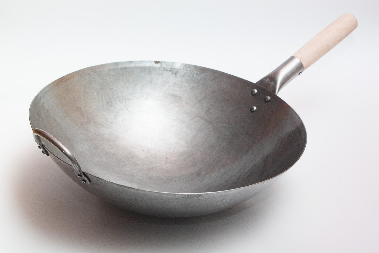 Craft Wok in use stir-fry over gas flame for fast searing benefit