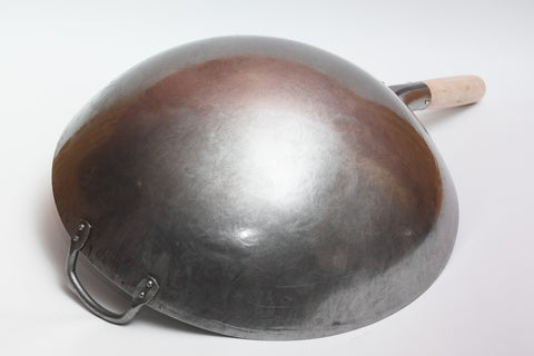 Craft Wok wooden handle detail offering secure, heat-resistant grip