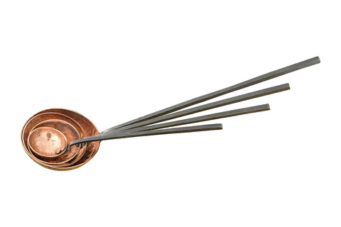 Creative Co-Op front view of four ladles showing rustic copper finish and handles, stylish serving