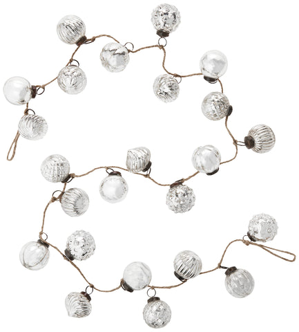 Creative Co-Op garland front view showing embossed ornaments and rope, enhances mantel styling