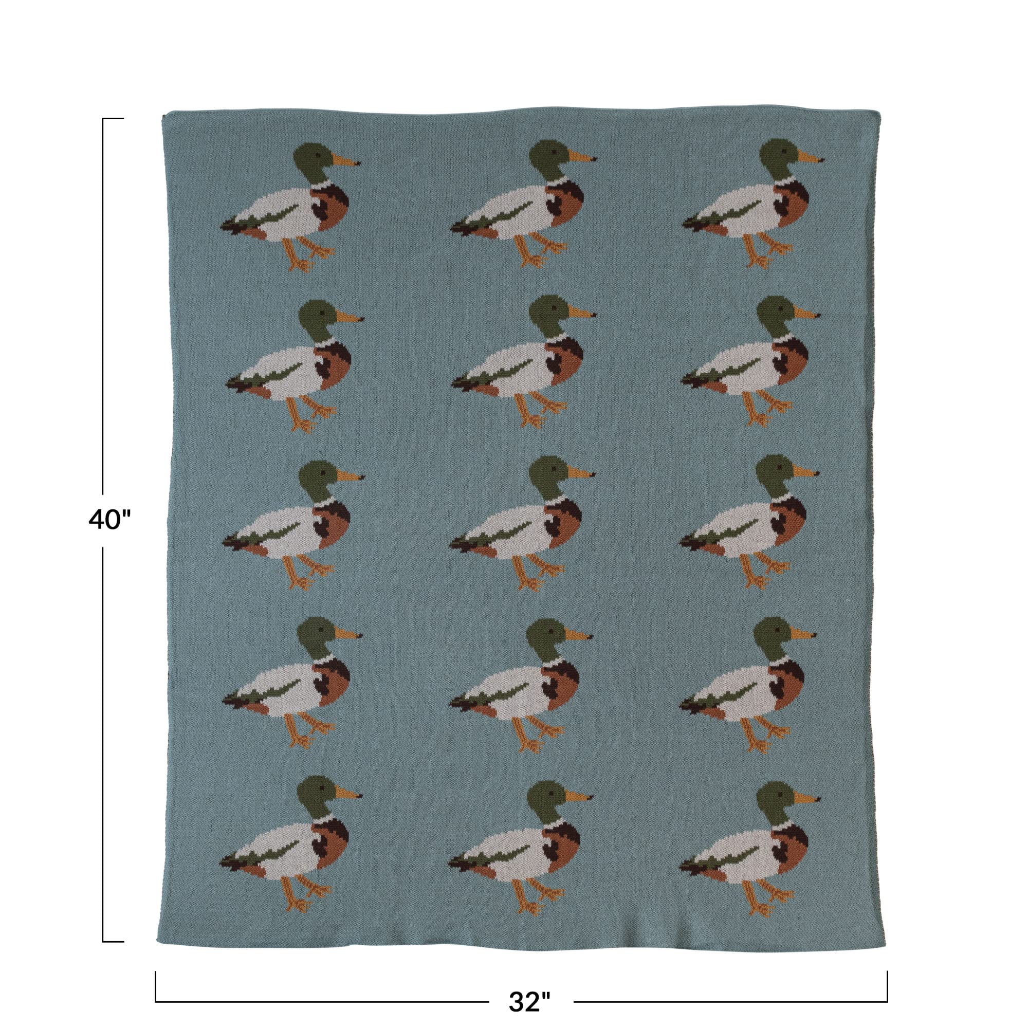Creative Co-Op blanket styled in crib adding color and playful charm to nursery