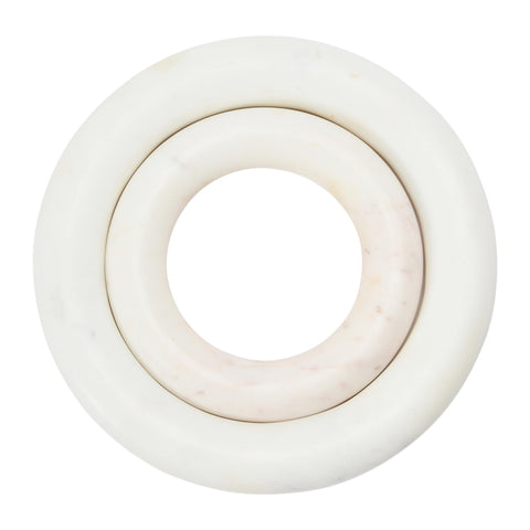Creative Co-Op marble trivet supporting a hot pot demonstrating heat shielding benefit