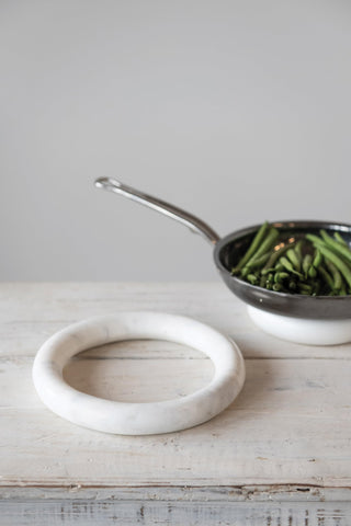 Creative Co-Op marble trivet in a modern kitchen lifestyle scene adding style and function benefit