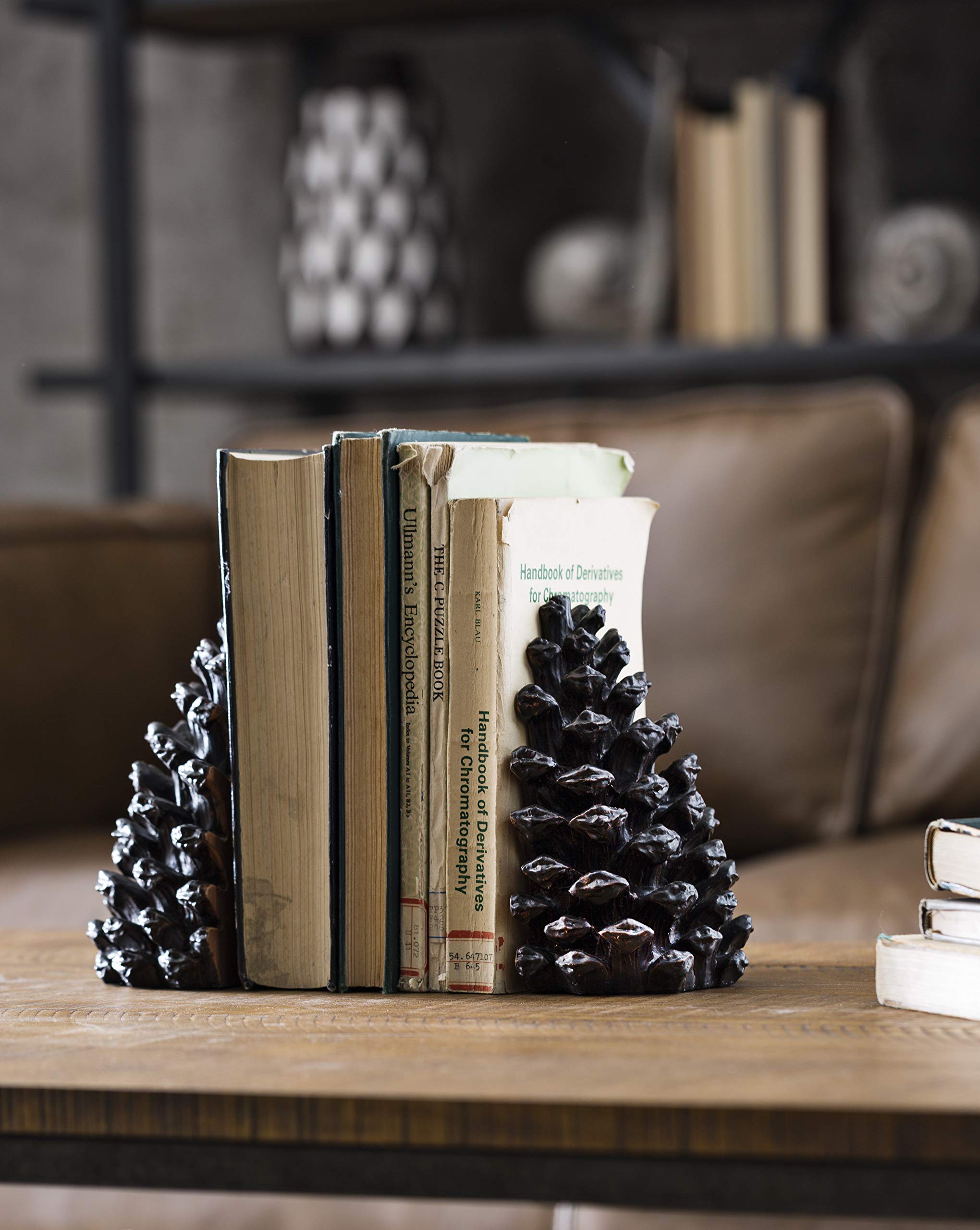Creative Co-Op pinecone bookends packaging and pair showing what’s included in set