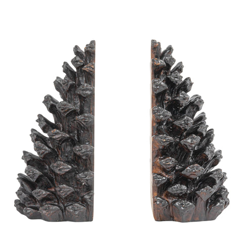 Creative Co-Op pinecone bookends styled on a bookshelf adding cozy cabin ambiance