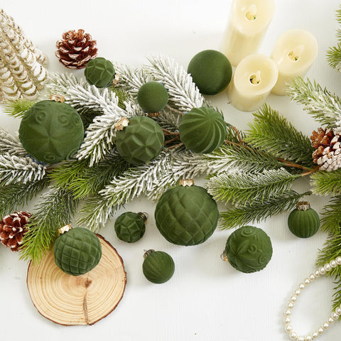 CristBest ornaments hanging on lit tree creating cozy festive atmosphere