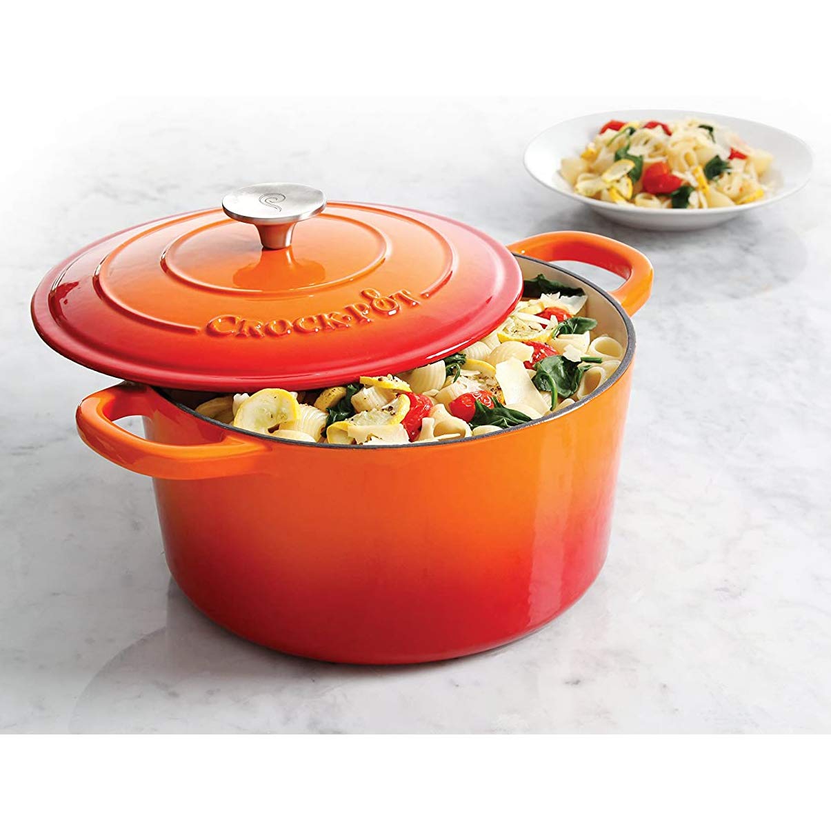 Crock-Pot in oven with roasted chicken illustrating oven-safe versatility