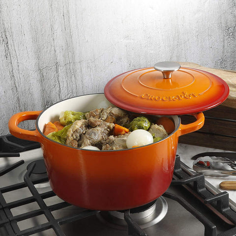 Crock-Pot beside utensils showing 5-quart scale for family-sized meals