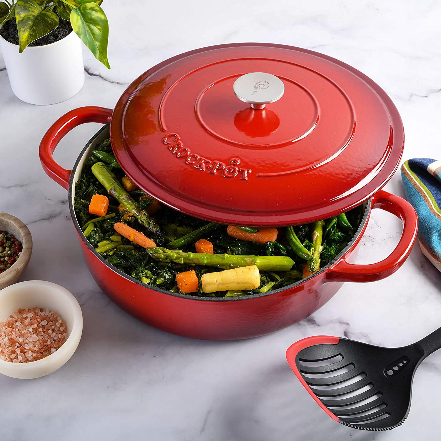 Crock-Pot braiser next to a wooden spoon showing scale and generous 5-quart capacity